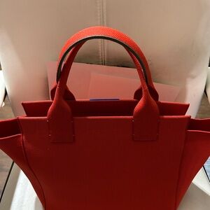 Rothys bright poppy handbag